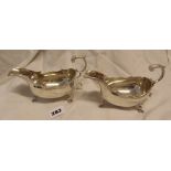 PAIR OF MID GEORGIAN DESIGN SILVER SAUCE BOATS WITH ACANTHUS LEAF CAPPED C SCROLL HANDLES ON