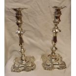 PAIR OF SILVER ROCOCO REVIVAL STYLE CANDLESTICKS WITH DETACHABLE SCONCES ON LOADED STEPPED BOXES -