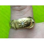 18CT YELLOW GOLD BUCKLE RING INSET WITH DIAMOND CHIP 2.