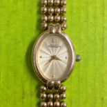 LADIES FRENCH MICHEL HERBLIN GOLD PLATED OVAL WRIST WATCH