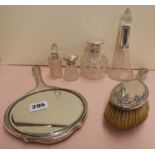 FOUR SILVER COLLARED GLASS SCENT BOTTLES,