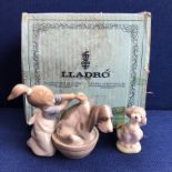 LLADRO FIGURE GROUP 'BASHFUL BATHER 5455 DATED 1987 AND A LLADRO DOG FIGURINE 'FRIEND FOR LIFE'