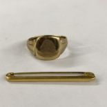 9CT GOLD GENTLEMEN'S SIGNET RING A/F AND A 9CT GOLD BAR BROOCH 4.