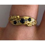 18CT YELLOW GOLD SAPPHIRE AND DIAMOND CROSSOVER, 2.