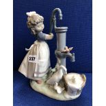 LLADRO FIGURE WITH A GIRL AT THE WATER PUMP A/F