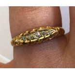 UNMARKED YELLOW GOLD FIVE STONE DIAMOND RING SIZE N 2.