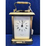 BERNARD FRERES OF BICESTER BRASS CARRIAGE CLOCK WITH ROMAN NUMERAL DIAL AND KEY