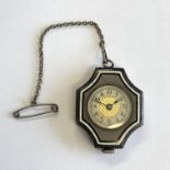 NURSE'S STYLE WATCH IN AN ENAMEL CASE WITH SAFETY PIN AND CHAIN