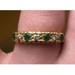 18CT YELLOW GOLD EMERALD AND DIAMOND RING 3.