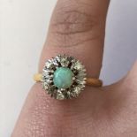 18CT YELLOW GOLD OPAL AND SIX DIAMOND CLUSTER DRESS RING 4.