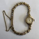 LADIES 9CT GOLD BENTIMA STAR 17 JEWEL WRIST WATCH AND STRAP WITH SAFETY CHAIN, 10.