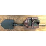 WWII US FOLDING ENTRENCHING TOOL IN GREEN CANVAS AND LEATHER BACKED POUCH