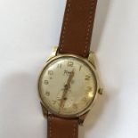 CASED GENTLEMEN'S PRESENTATION TIMOR 21 JEWEL WRIST WATCH ON LEATHER STRAP