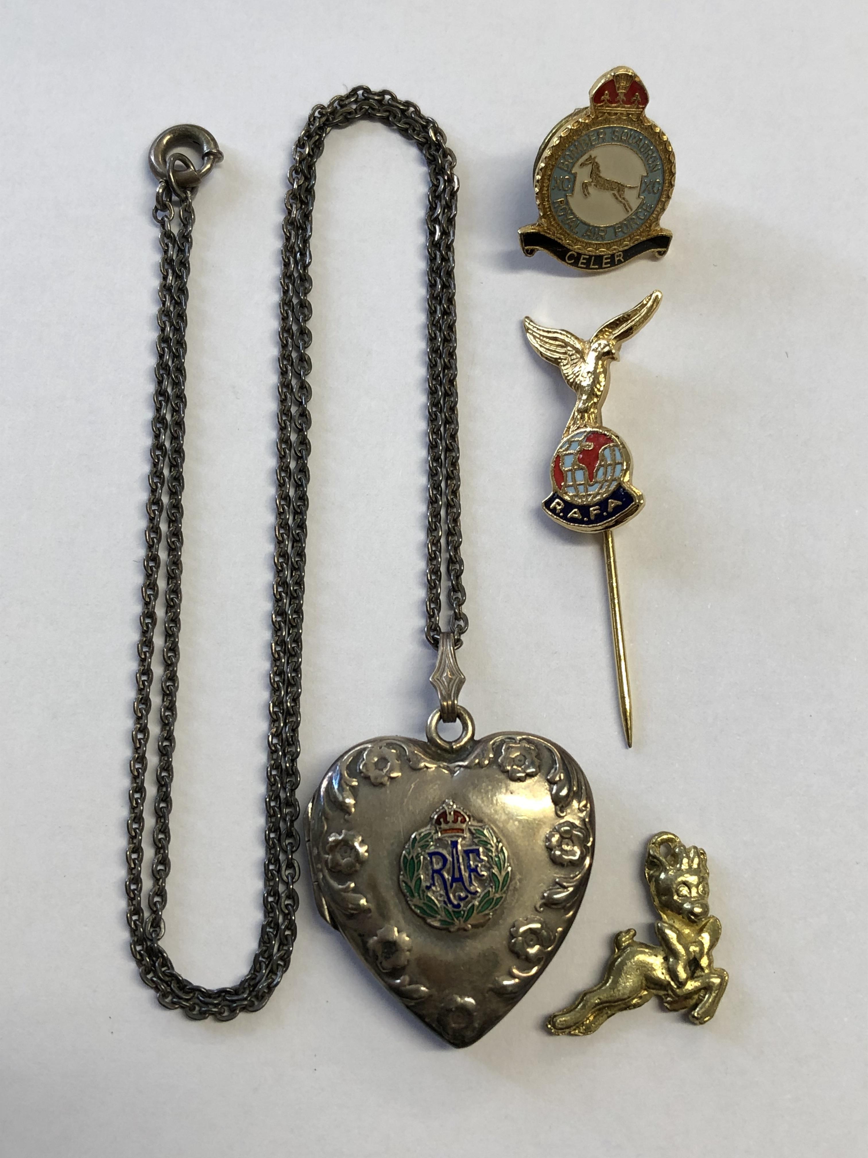 STERLING SILVER HEART SHAPED LOCKET ON TRACE CHAIN WITH ENAMELLED RAF INSIGNIA AND RAF LAPEL BADGES