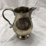 SMALL LONDON SILVER BALUSTER CREAM JUG WITH C SCROLL HANDLE