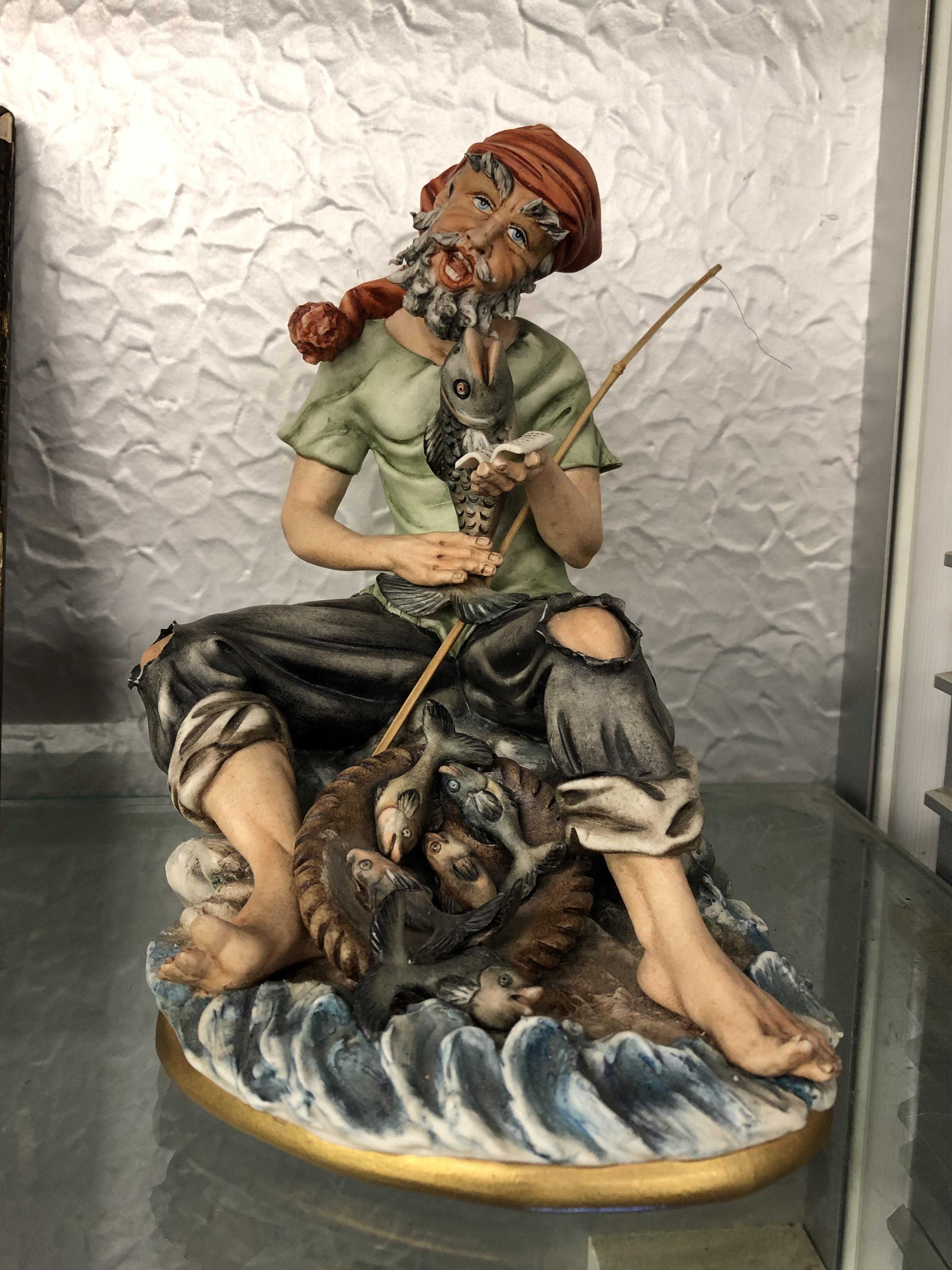 CAPO DI MONTE PORCELAIN FIGURE GROUP OF A SEATED FISHERMAN BY CORTEZ NO 329