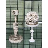 LATE 19TH /EARLY 20TH CENTURY IVORY FIGURAL STAND WITH CARVED DRAGON CONCENTRIC BALL