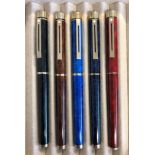 FIVE SHEAFFER TARGA FOUNTAIN PENS - MOTTLED RED, DARK BLUE, ROYAL BLUE,