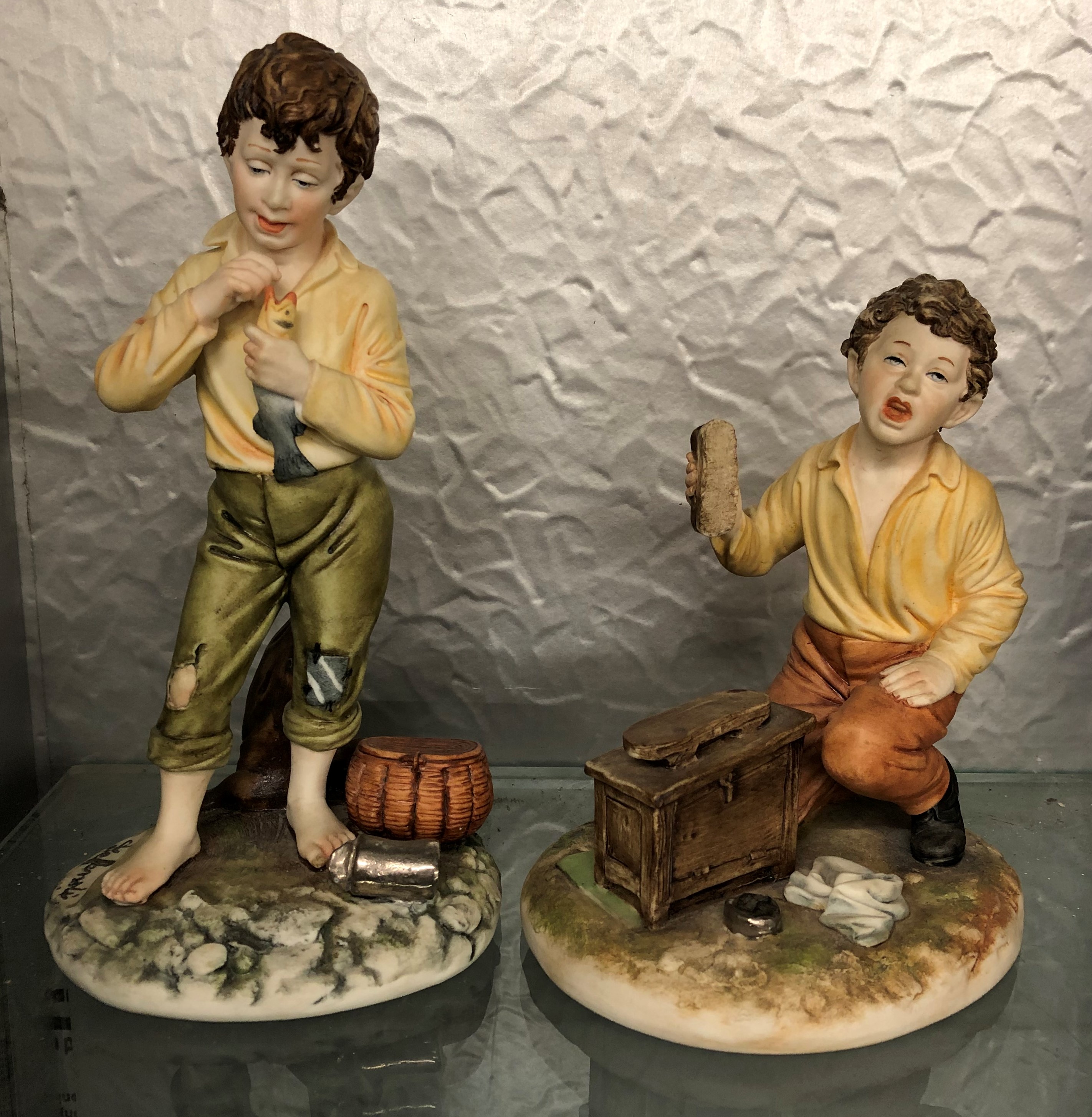 PAIR OF CAPO DI MONTE PORCELAIN FIGURES OF BOYS