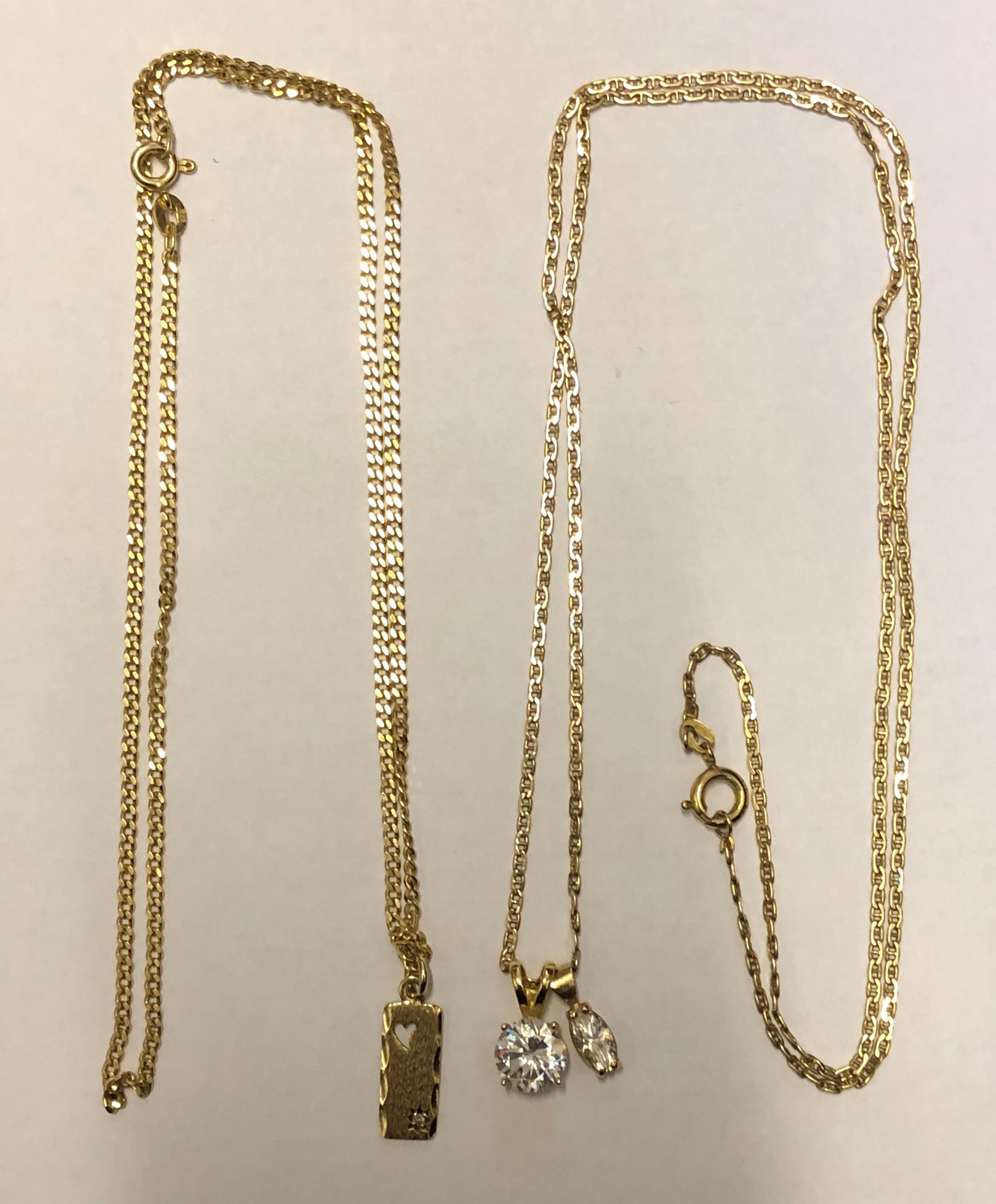 9CT GOLD FLAT LINK CHAIN WITH A 9CT GOLD MOUNTED MARQUISE PENDANT AND 925 CZ PENDANT AND A FLAT