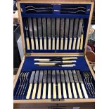 OAK CANTEEN BOX OF A1 PLATED CUTLERY IN AN OAK TABLE CABINET WITH LOCKING PILASTERS