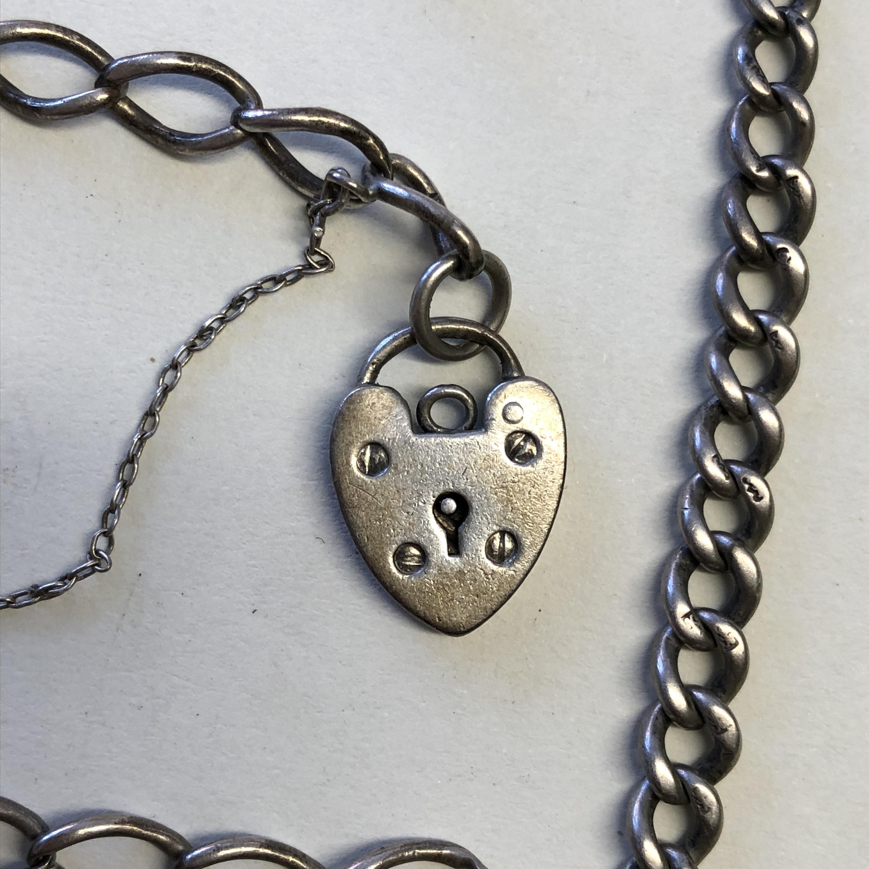 SILVER GRADUATED LINK ALBERT CHAIN AND T BAR AND A SILVER LINK BRACELET WITH HEART PADLOCK - Image 2 of 8