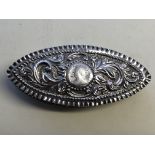 VICTORIAN SILVER NAVETTE SHAPED REPOUSSE BOX WITH INSET COIN TO LID,