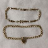 9CT GOLD BELCHER LINK BRACELET WITH HEART PADLOCK AND A 9CT GOLD OVAL LINK AND SEED PEARL BRACELET