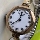 LADIES 9CT ROSE GOLD CASED WRIST WATCH ON EXPANDING STRAP