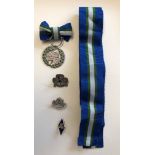 SELECTION OF GIRL GUIDE BADGES AND RELATED RIBBONS