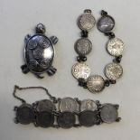TEN ORE AND TWO ANNA COIN BRACELETS AND SILVER TURTLE BROOCH