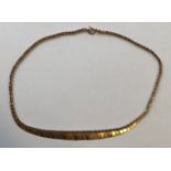 9CT THREE COLOUR GOLD CLEOPATRA STYLE NECKLET 6.