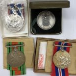 BOXED WWII MEDALS - DEFENCE AND WAR MEDAL 1939-1945 WITH RIBBONS AND NATIONAL SERVICE 1939-1960