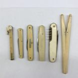 SELECTION OF BONE GLOVE STRETCHERS,