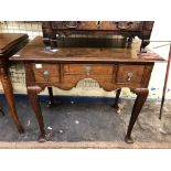 18TH CENTURY OAK LOWBOY WITH THREE PINE LINED DRAWERS HAVING COCK BEADED DECORATION ON A CABRIOLE