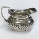 BIRMINGHAM SILVER GADROONED CREAM JUG 3.