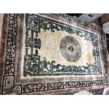 LARGE PERSIAN WASH WOOLLEN RUG ON A BEIGE AND SALMON GROUND DEPICTING ANIMAL AND BIRD FIGURES 185CM