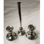 PAIR OF SILVER DWARF CANDLE HOLDERS AND SILVER TAPERED SPILL VASE