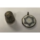 SILVER THIMBLE AND A SILVER AND GUILLOCHE ENAMEL LOCKET