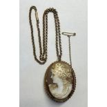 9CT GOLD OVAL MOUNTED CLASSICAL CAMEO BROOCH ON ROSE GOLD CHAIN 20G OVERALL