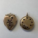 9CT GOLD CIRCULAR RUBY INSET LOCKET 7.