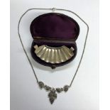 CASED MOUSTACHE CUP GUARD AND CASED WHITE METAL MARCASITE VINE LEAVES AND GRAPES PENDANT NECKLACE