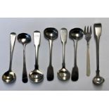 SEVEN SILVER MUSTARD AND PRESERVE SPOONS AND AN EPNS MOTHER OF PEARL PICKLE FORK