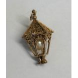 9CT GOLD NOVELTY HEXAGONAL OPEN LANTERN CHARM 4.7G APPROX.