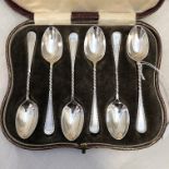 CASED SET OF ELKINGTON AND CO TEA SPOONS WITH SPIRAL TWIST STEMS AND BRIGHT CUT DECORATION,