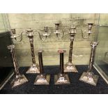 THREE PAIRS OF 19TH CENTURY NEO CLASSICAL STYLE CORINTHIAN AND ACANTHUS CAPPED CANDLESTICKS