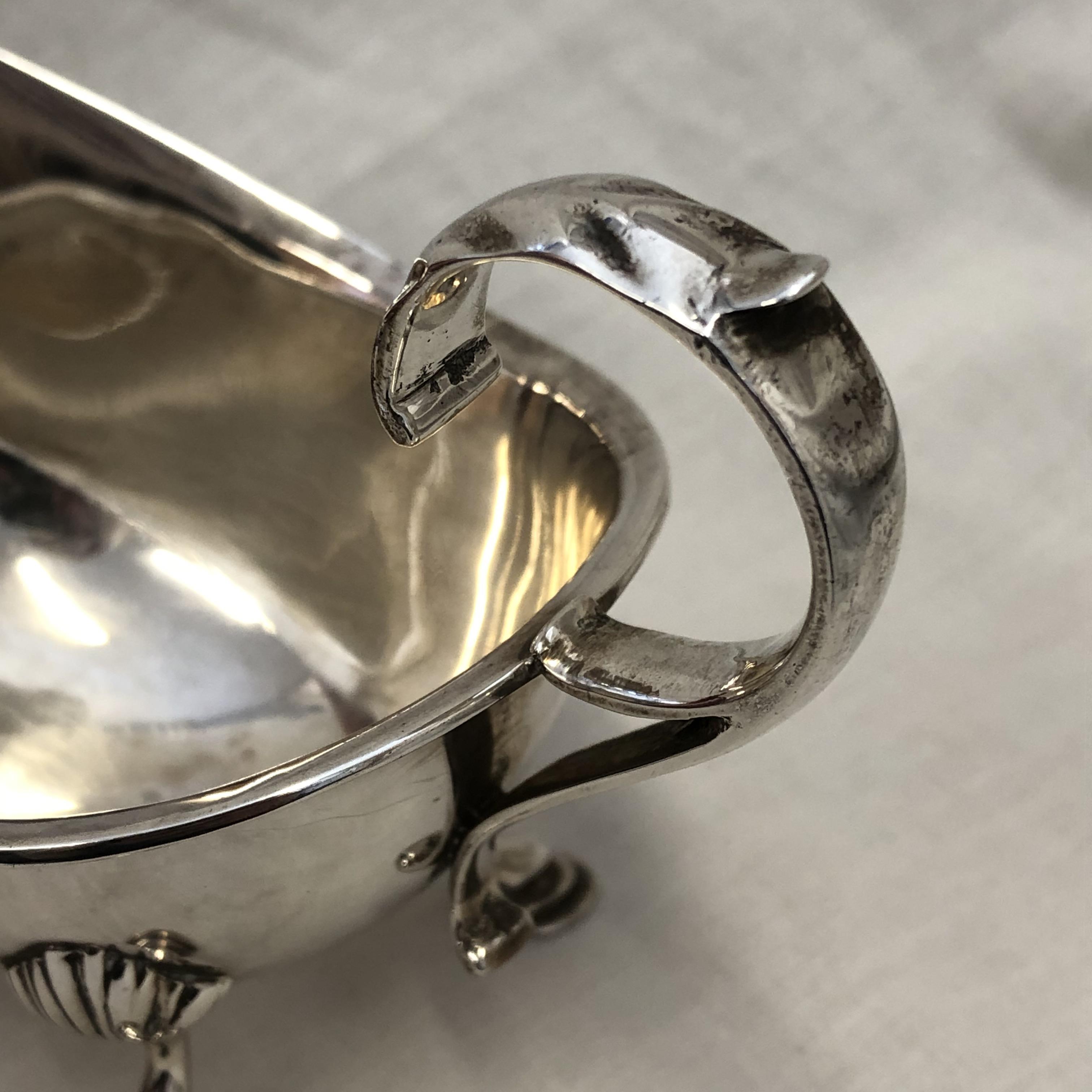 SILVER SAUCE BOAT WITH OPEN SCROLL HANDLE RAISED ON CABRIOLE LEGS WITH PAD FEET, 3.3OZ APPROX. - Image 3 of 4