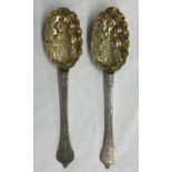 PAIR OF SILVER GILT LONDON SPOONS WITH ENGRAVED ARMORIAL AND BERRIES TO THE BOWL 3 OZ APPROX