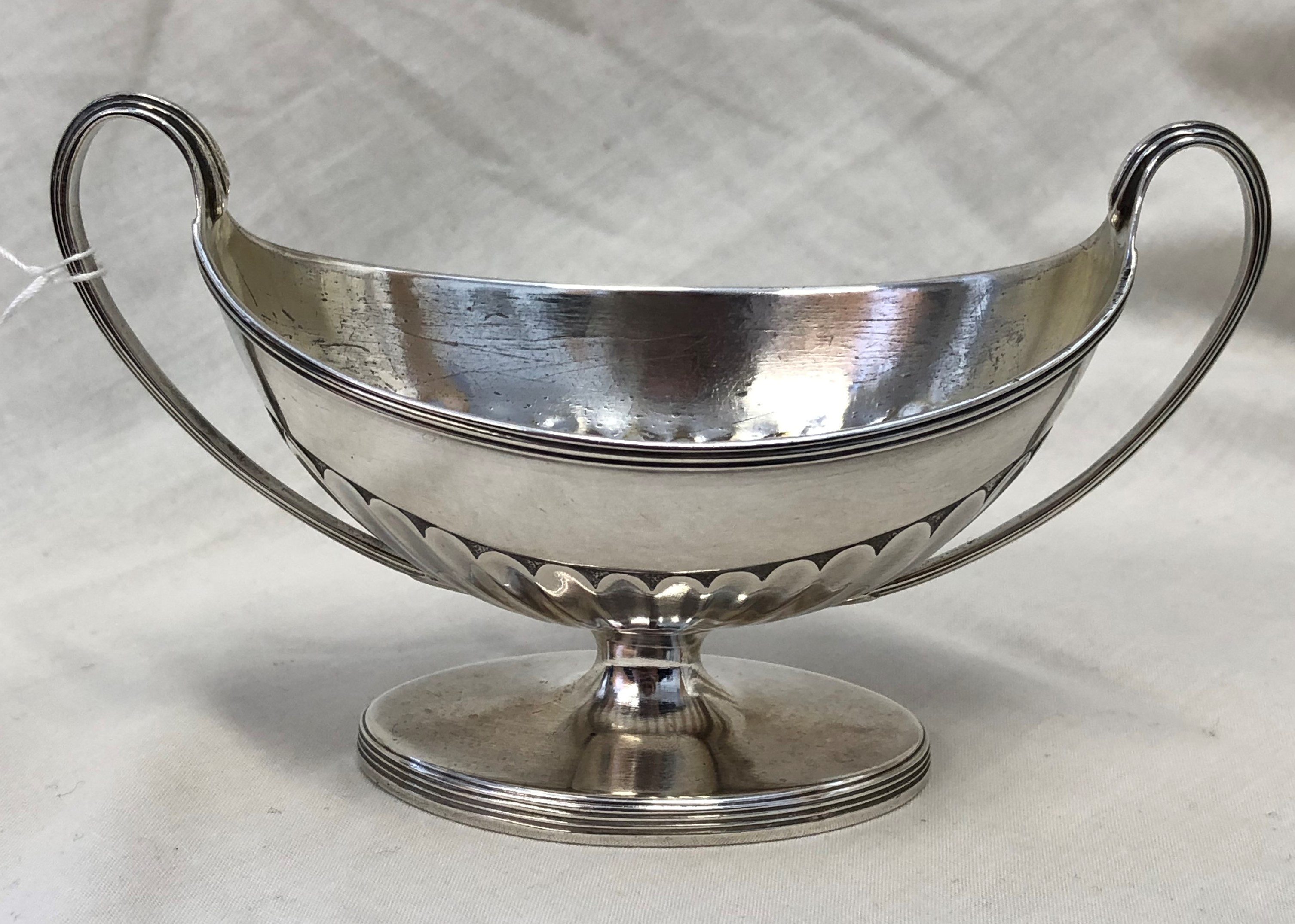 GEORGE III NEOCLASSICAL TWIN HANDLED BOAT SHAPED TABLE SALT, LONDON, HC, 3OZ APPROX.