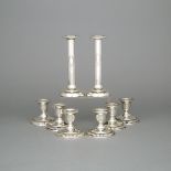 Eight Canadian Silver Candlesticks, Henry Birks & Sons, Montreal, 1904-24, largest height 7.4 in — 1